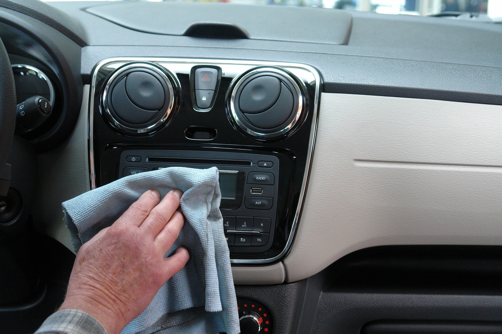 Cockpit and dashboard in the interior is cleaned with microfibre cloth